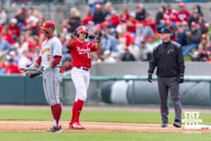 Nebraska Cornhusker Dylan Carey (15) celebrates hitting a single against the Southern California Trojans in the first inning during a college baseball game on Saturday, April 18, 2026, in Lincoln, Neb. Photo by John S. Peterson.
