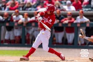 Nebraska Cornhusker Mac Moyer (17) hits a single in the first inning against the Southern California Trojans during a college baseball game on Saturday, April 18, 2026, in Lincoln, Neb. Photo by John S. Peterson.