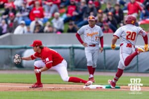 Nebraska Cornhusker infielder Case Sanderson (14) forces out Southern California Trojan Isaac Cadena (20) at first base in the first inning during a college baseball game on Saturday, April 18, 2026, in Lincoln, Neb. Photo by John S. Peterson.