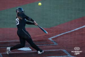 Omaha Softball Ava Rongisch (23) hits during a college softball game against South Dakota State on April 18, 2026, in Omaha, Nebraska. Photo by Brandon Tiedemann