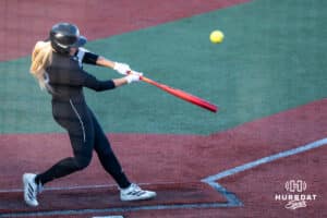Omaha Softball Emma Durr (32) hits during a college softball game against South Dakota State on April 18, 2026, in Omaha, Nebraska. Photo by Brandon Tiedemann