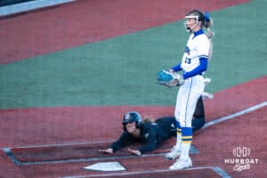 Omaha Softball Ava Rongisch (23) steals home during a college softball game against South Dakota State on April 18, 2026, in Omaha, Nebraska. Photo by Brandon Tiedemann