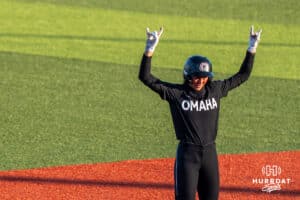 Omaha Softball Marra Cramer (9) celebrates a double during a college softball game against South Dakota State on April 18, 2026, in Omaha, Nebraska. Photo by Brandon Tiedemann