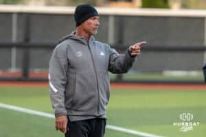 Omaha Softball head coach Mike Heard asks if he should challenge during a college softball game against South Dakota State on April 18, 2026, in Omaha, Nebraska. Photo by Brandon Tiedemann