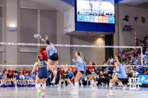 Creighton Bluejay middle blocker Eloise Brandewie (10) spikes the ball against Nebraska Cornhusker middle blocker Keoni Williams (17) in the fourth set during a college volleyball match on Friday, April 17, 2026, in Omaha, Neb. Photo by John S. Peterson.