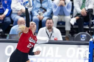Nebraska Cornhusker outside hitter Gabby DiVita (23) spikes the ball against the Creighton Bluejays in the fourth set during a college volleyball match on Friday, April 17, 2026, in Omaha, Neb. Photo by John S. Peterson.