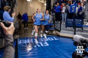 Creighton Bluejays run out to take on the Nebraska Cornhuskers during a college volleyball match on Friday, April 17, 2026, in Omaha, Neb. Photo by John S. Peterson.