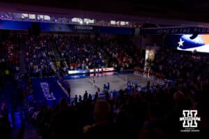 The National Anthem is being performed before the match between Creighton Bluejays and Nebraska Cornhuskers during a college volleyball match on Friday, April 17, 2026, in Omaha, Neb. Photo by John S. Peterson.