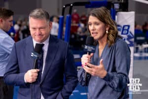 Larry Putney and former Creighton head coach Kirsten Bernthal Booth on the call for Nebraska Public Media TV coverage of the game between the Creighton Bluejays and Nebraska Cornhuskers during a college volleyball match on Friday, April 17, 2026, in Omaha, Neb. Photo by John S. Peterson.