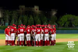 ebraska Cornhuskers huddle up after the win against the Creighton Bluejays during a college baseball game on Tuesday, April 14, 2026, in Lincoln, Neb. Photo by John S. Peterson.
