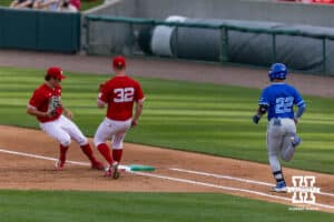 Creighton Bluejay Chris Baillargeon (22) grounds out to Nebraska Cornhusker infielder Case Sanderson (14), forcing him out in the third during a college baseball game on Tuesday, April 14, 2026, in Lincoln, Neb. Photo by John S. Peterson.