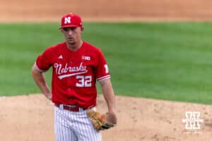 Nebraska Cornhusker pitcher Tucker Timmerman (32) is waiting on the umpire reviewing a play in the third against the Creighton Bluejays during a college baseball game on Tuesday, April 14, 2026, in Lincoln, Neb. Photo by John S. Peterson.