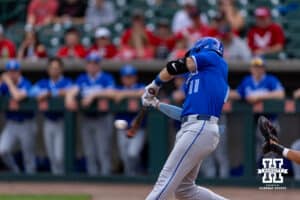 Creighton Bluejay Ben North (11) singles in the first against the Nebraska Cornhuskers during a college baseball game on Tuesday, April 14, 2026, in Lincoln, Neb. Photo by John S. Peterson.