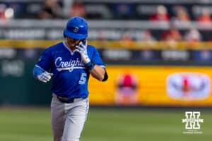 Creighton Bluejay Nate McHugh (5) jogs the bases after hitting a homerun against the Nebraska Cornhuskers in the first inning during a college baseball game on Tuesday, April 14, 2026, in Lincoln, Neb. Photo by John S. Peterson.
