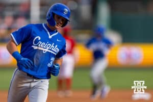 Creighton Bluejay Lew Rice (3) jogs to home after Nate McHugh hits a home run in the first inning during a college baseball game on Tuesday, April 14, 2026, in Lincoln, Neb. Photo by John S. Peterson.