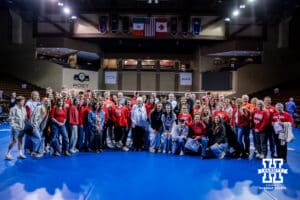 Nebraska Cornhusker setter Bergen Reilly (2) poses with family and friends after the match against the Iowa State Cyclones during a college volleyball match on Saturday, April 11, 2026, in Lincoln, Neb. Photo by John S. Peterson.