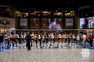 Nebraska Cornhuskers and Iowa State Cyclones shake hands after a college volleyball match on Saturday, April 11, 2026, in Lincoln, Neb. Photo by John S. Peterson.