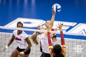 Nebraska Cornhusker setter Campbell Flynn (4) tips the ball against the Iowa State Cyclones in the fourth set during a college volleyball match on Saturday, April 11, 2026, in Lincoln, Neb. Photo by John S. Peterson.