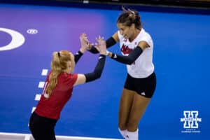 Nebraska Cornhusker outside hitter Skyler Pierce (21) and Olivia Mauch celebrate a point against the Iowa State Cyclones during a college volleyball match on Saturday, April 11, 2026, in Lincoln, Neb. Photo by John S. Peterson.