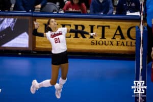 Nebraska Cornhusker outside hitter Skyler Pierce (21) spikes the ball against the Iowa State Cyclones during a college volleyball match on Saturday, April 11, 2026, in Lincoln, Neb. Photo by John S. Peterson.