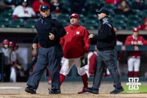 Nebraska Cornhusker head coach Will Bolt comes out of the dugout to complain to the umpire against the Kansas Jayhawks in the ninth inning during a college baseball game on Tuesday, April 7, 2026, in Lincoln. Photo by John S. Peterson.