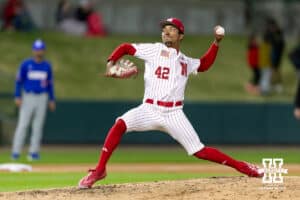 Nebraska Cornhusker pitcher Jalen Worthley (42) throws a pitch against the Kansas Jayhawks in the eighth inning during a college baseball game on Tuesday, April 7, 2026, in Lincoln. Photo by John S. Peterson.