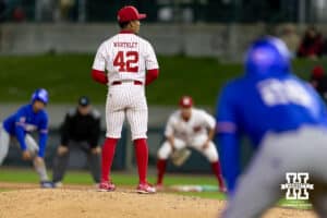 Nebraska Cornhusker pitcher Jalen Worthley (42) prepares to throw a pitch bases loaded against the Kansas Jayhawks in the seventh inning during a college baseball game on Tuesday, April 7, 2026, in Lincoln. Photo by John S. Peterson.