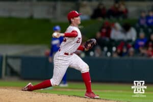 Nebraska Cornhusker pitcher Kevin Mannell (20) throws a pitch against the Kansas Jayhawks in the seventh inning during a college baseball game on Tuesday, April 7, 2026, in Lincoln. Photo by John S. Peterson.