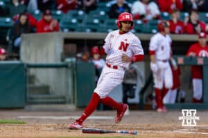 Nebraska Cornhusker catcher Jeter Worthley (0) scores a run against the Kansas Jayhawks in the fifth during a college baseball game on Tuesday, April 7, 2026, in Lincoln. Photo by John S. Peterson.