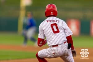 Nebraska Cornhusker catcher Jeter Worthley (0) singles in the fifth inning against the Kansas Jayhawks during a college baseball game on Tuesday, April 7, 2026, in Lincoln. Photo by John S. Peterson.