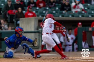 Nebraska Cornhusker Miken Miller (26) singles in the second inning against the Kansas Jayhawks during a college baseball game on Tuesday, April 7, 2026, in Lincoln. Photo by John S. Peterson.