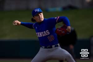 Kansas Jayhawk pitcher Kannon Carr (18) throws a pitch in the first inning against the Nebraska Cornhuskers during a college baseball game on Tuesday, April 7, 2026, in Lincoln. Photo by John S. Peterson.
