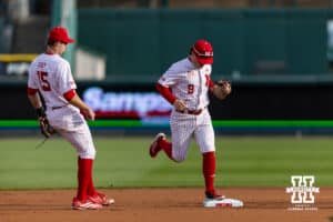 Nebraska Cornhusker infielder Rhett Stokes (9) makes a out against the Kansas Jayhawks in the first inning during a college baseball game on Tuesday, April 7, 2026, in Lincoln. Photo by John S. Peterson.