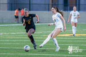 Pius’ Cammie Hodge (25) passes the ball against Gretna East during a high school girls soccer game Monday, March 30, 2026, in Gretna, Nebraska. Photo by Jackson D. Luethje.