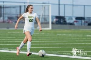Pius’ Brooke Thomsen (22) dribbles the ball against Gretna East during a high school girls soccer game Monday, March 30, 2026, in Gretna, Nebraska. Photo by Jackson D. Luethje.