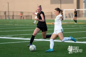 Pius’ Kenzie Nickolite (5) guarded by Gretna East’s Ellie Leahy (31) during a high school girls soccer game Monday, March 30, 2026, in Gretna, Nebraska. Photo by Jackson D. Luethje.