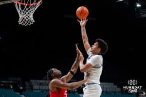 Creighton Bluejay forward Jasen Green (0) shoots over Rutgers Scarlet Knight guard Darren Buchanan Jr. (5) during the first round of the Crown tournament on Thursday, April 2, 2026, in Las Vegas, Nevada. Photo by Cole Curtis.