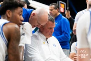 Creighton Bluejay head coach Greg McDermott working with his players in a huddle against the Rutgers Scarlet Knight during the first round of the Crown tournament on Thursday, April 2, 2026, in Las Vegas, Nevada. Photo by Cole Curtis.