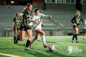 Southwest’s Ansley Throener (9) battles for the ball against Southeast’s Caitlyn Olsen (16) during a high school girls’ soccer game Tuesday, March 31, 2026, in Lincoln, Nebraska. Photo by Jackson D. Luethje.