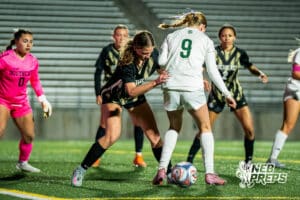 Southwest’s Ansley Throener (9) battles for the ball against Southeast’s Caitlyn Olsen (16) during a high school girls’ soccer game on Tuesday, March 31, 2026, in Lincoln, Nebraska. Photo by Jackson D. Luethje.