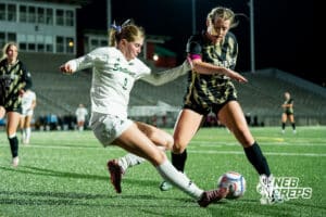 Southeast’s Sutton Antholz (22) guarded by Southwest’s Ansley Throener (9) during a high school girls’ soccer game on Tuesday, March 31, 2026, in Lincoln, Nebraska. Photo by Jackson D. Luethje.