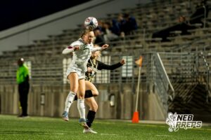 Southwest’s Creighton Allen (3) heads the ball against Southeast during a high school girls’ soccer game Tuesday, March 31, 2026, in Lincoln, Nebraska. Photo by Jackson D. Luethje.