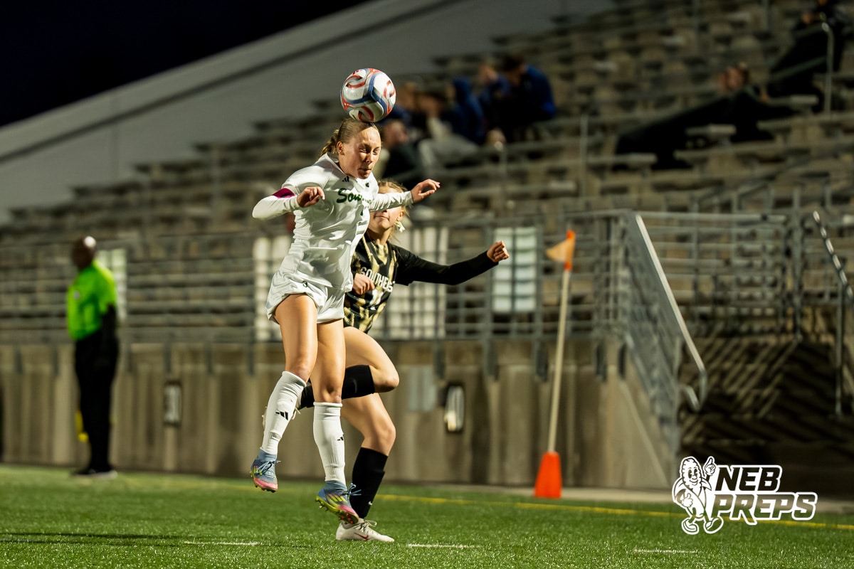 Southwest’s Creighton Allen (3) heads the ball against Southeast during a high school girls’ soccer game Tuesday, March 31, 2026, in Lincoln, Nebraska. Photo by Jackson D. Luethje.