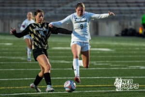 Southwest’s Ansley Throener (9) guarded by Southeast’s Caitlyn Olsen (16) during a high school girls’ soccer game on Tuesday, March 31, 2026, in Lincoln, Nebraska. Photo by Jackson D. Luethje.