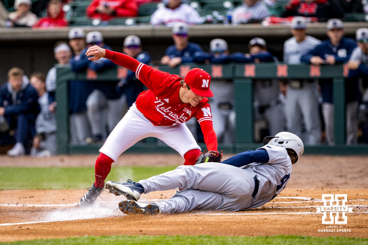 Nebraska’s Ty Horn (2) is getting Penn State’s Jack Porter (47) out at home plate during a collegiate baseball game on Saturday, April 4, 2026, in Lincoln, Nebraska. Photo By Jack Stephens.