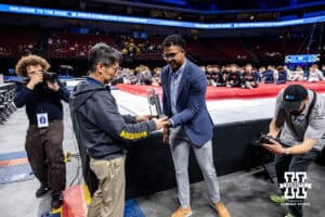 Michigan head coach Yuan Xiao was presented with the Big Ten Coach of the Year during the Big Ten Men’s Gymnastics Championships on Saturday, April 4, 2026, in Lincoln. Photo by John S. Peterson.