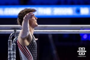 Nebraska Cornhusker Nathan York performs on the parallel bars during the Big Ten Men’s Gymnastics Championships on Saturday, April 4, 2026, in Lincoln. Photo by John S. Peterson.