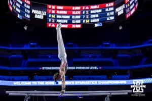 Nebraska Cornhusker Nathan York performs on the parallel bars during the Big Ten Men’s Gymnastics Championships on Saturday, April 4, 2026, in Lincoln. Photo by John S. Peterson.