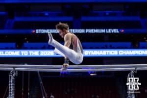 Nebraska Cornhusker Nathan York performs on the parallel bars during the Big Ten Men’s Gymnastics Championships on Saturday, April 4, 2026, in Lincoln. Photo by John S. Peterson.
