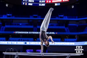 Nebraska Cornhusker Nathan York performs on the parallel bars during the Big Ten Men’s Gymnastics Championships on Saturday, April 4, 2026, in Lincoln. Photo by John S. Peterson.